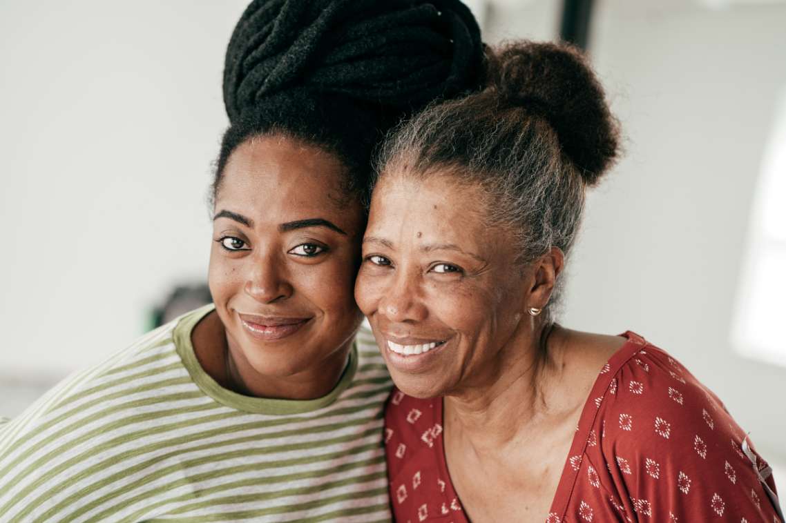 two people smiling