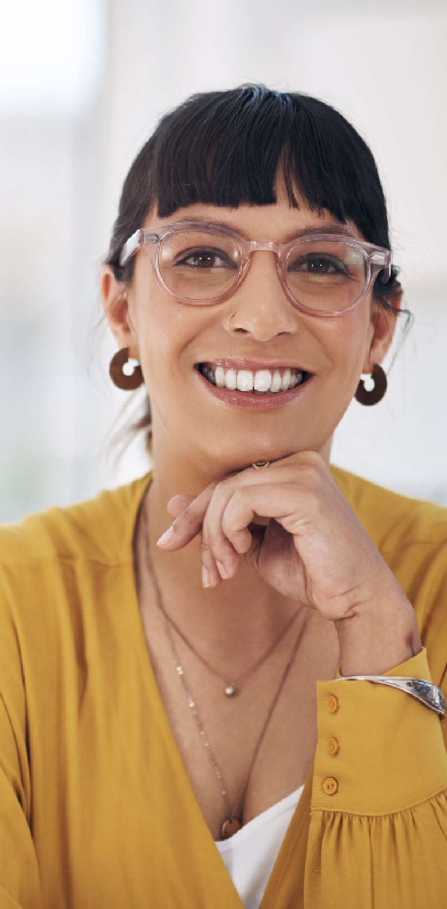 lady in glasses smiling