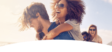 people smiling in the sun, eating disorder treatment