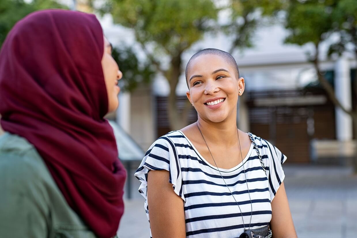 people smiling in the sun, eating disorder treatment